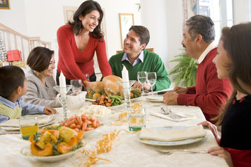 Family All Together At Christmas Dinner