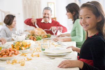 Family All Together At Christmas Dinner