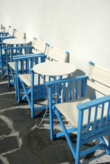 Cafe tables and chairs. Mykonos. Greece