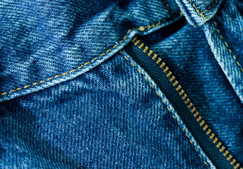 Blue jeans close-up with zipper and stiches