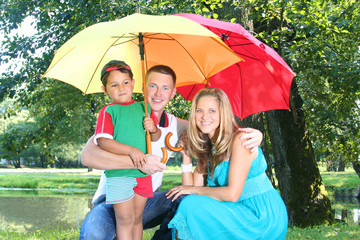 happy family walking in park