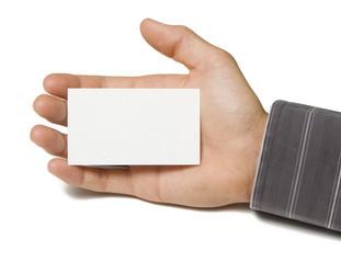 Blank business card in hand on white background