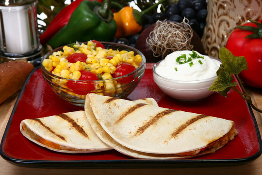 chicken quesadilla in kitchen or restaurant.
