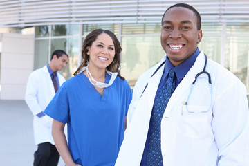 A happy and successful medical team outside hospital