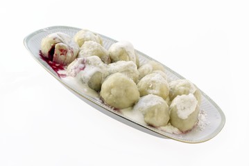 dumplings wirh plums,cream and sugar for lunch