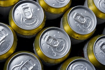 Cans of beer with condensation droplets