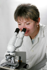 Scientist and microscope