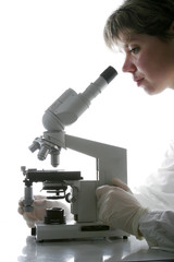 Scientist and microscope