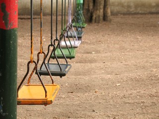 Static swings in a playground
