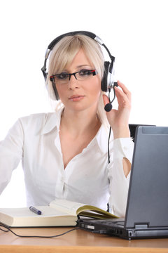 Blond call center operator working