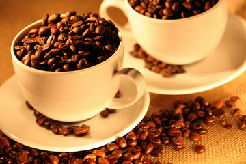 Cups of coffee, full of beans..