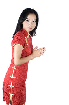 Chinese girl in kind pose, welcoming guests or visitors