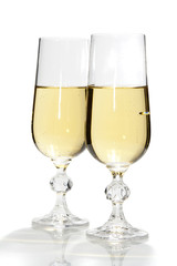 Two glasses with champagne, isolated, over white