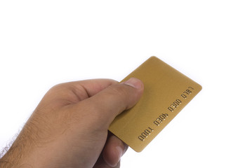 A hand holding credit card isolated on a white background