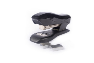 Stapler and staples isolated on a white background