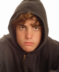 fourteen year old teenage with aggressive bully expression.