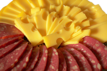 The firm cheese sliced and blood sausage with fat