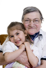 A happy family bonding together. A grandmother and Granddaugher