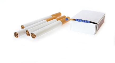 Cigarettes with matchbox isolated on white