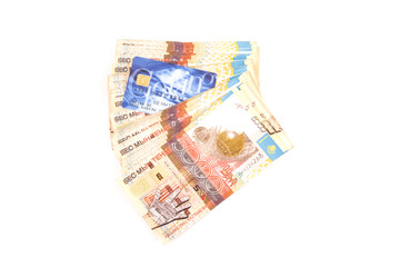 Stack of money or one credit card, isolated, white, finance