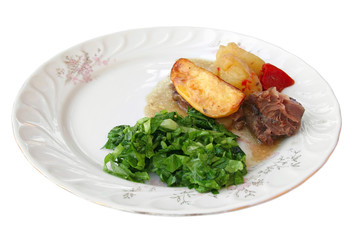 Roasted lamb with baked potatoes, garnished with lettuce