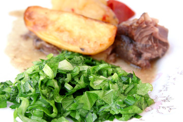 Lettuce as a garnish with meat