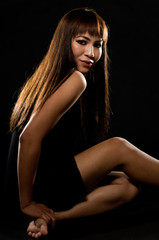 Fototapeta na wymiar Beautiful Thai asian woman on black