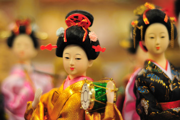 Naklejka premium Japanese puppet wearing kimono, selective focus