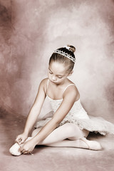 Young dancer wearing a tutu and tiara