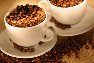 Cups of coffee, full of beans..