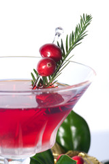 Cosmopolitan cocktail in martini glass Christmas decoration.