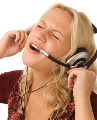 the lovely blond woman with headset on white background