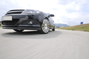 Fast car moving with motion blur