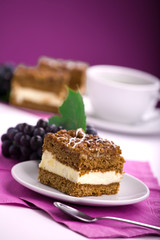 Delicious cream cake and coffee.