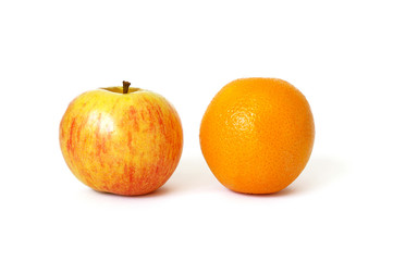 Orange and apple isolated on a white background