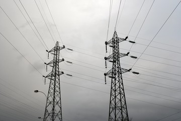High voltage electric pillars, overcast sky