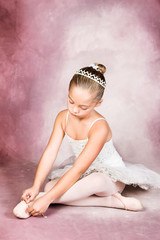 Young dancer wearing a tutu and tiara