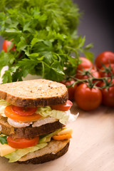 Healthy sandwich made with whole grain bread and chicken