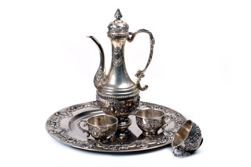 Old silver jug and goblets