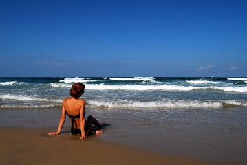 Woman on the beautiful beach of sea