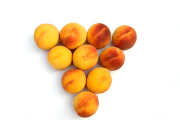 triangle peaches isolated on white