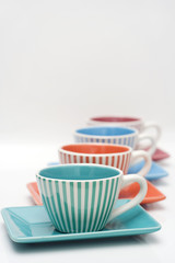 four cups of coffee isolated on white