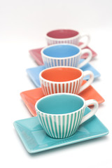 four cups of coffee isolated on white