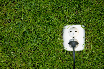 energy concept outllet in grass