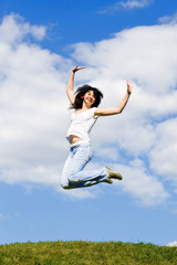 pretty young woman is jumping