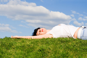 sweet woman rest on the grass