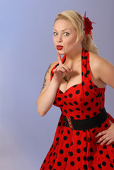 fifties style attractive pinup girl gestures - humorous