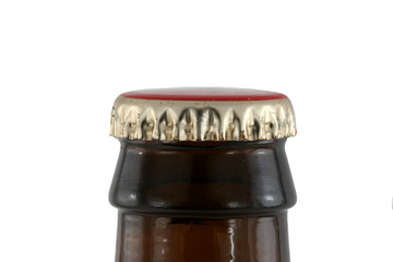 A Isolated brown beer bottle with cap