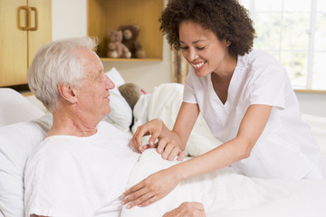 Nurse Helping Senior Man