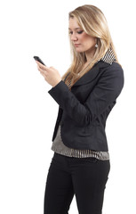 Fototapeta premium Beautiful blonde businesswoman wearing office clothes typing